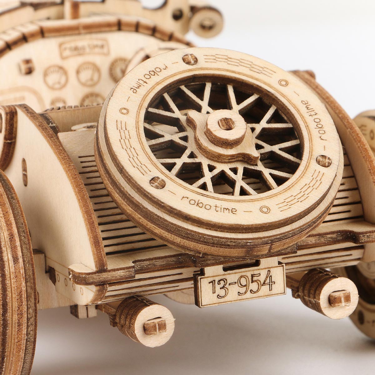 ROKR Grand Prix Car MC401 3D wooden vehicle model kit, lifestyle scene on a wooden desk