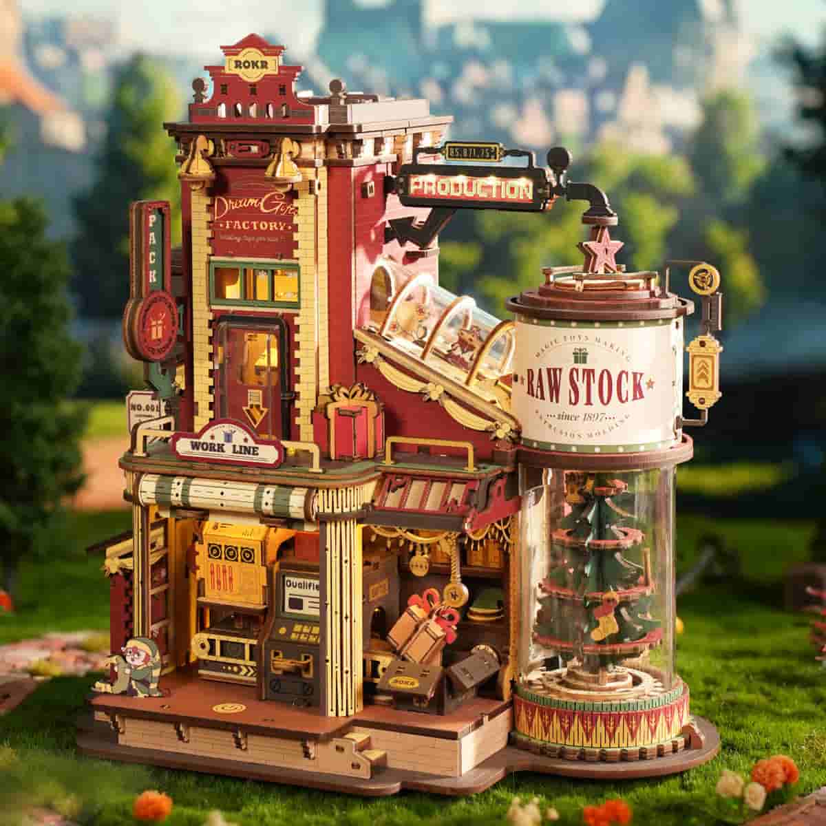 ROKR Dream Gift Factory EAB01 full-scale outdoor fantasy shot showing complete red wooden building against green rolling hills