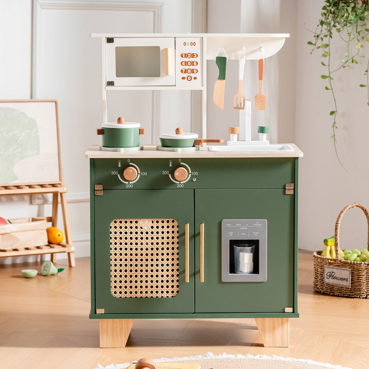 ROBUD vintage green full play kitchen set placed in a warm playroom with rattan panel, stove knobs, and gold-tone hardware