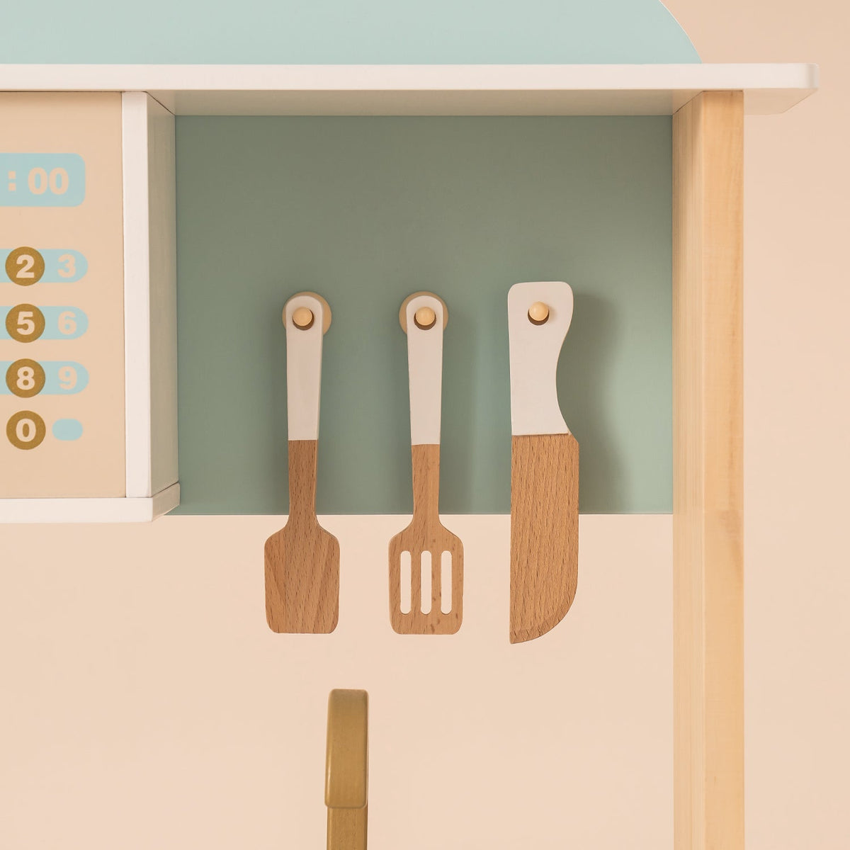 ROBUD kitchen accessory rail with three wooden cooking tools including spatula, spoon and knife in natural tan